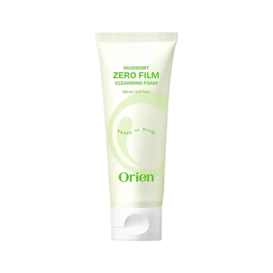 A sleek translucent white tube of orien mugwort zero film cleansing foam with a minimalist green label and cap