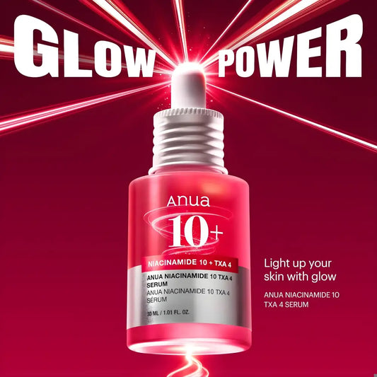 A sleek red glass bottle of anua niacinamide 10% txa 4 serum for dark spots with tranexamic acid in korean skincare south