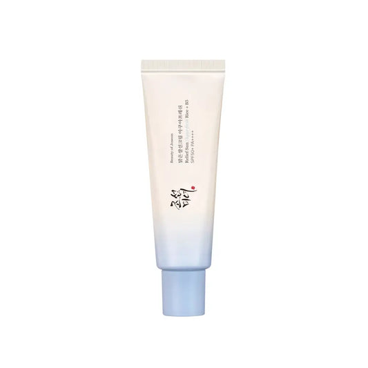 A sleek relief sun aqua-fresh rice b5 sunscreen tube with gradient pastel blue to white and k-beauty south africa appeal