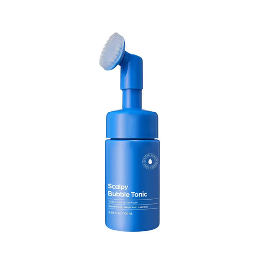 Blue cylindrical bottle of scalpy bubble tonic 100ml with built-in white brush for scalp care application