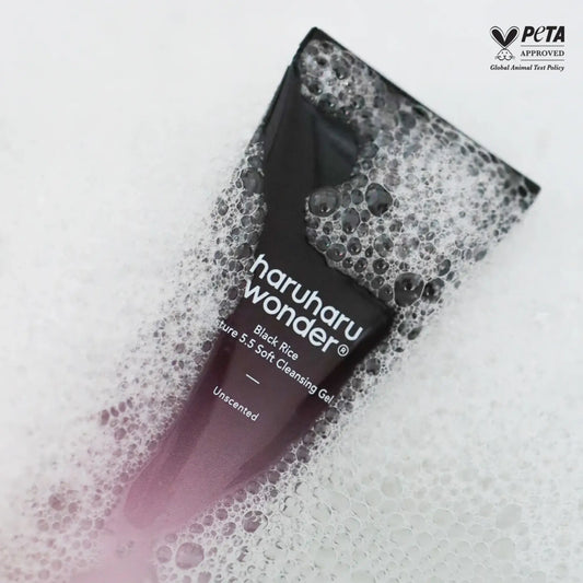 A sleek black and purple gradient tube of haruharu wonder black rice soft cleansing gel with bubbly foam for k-beauty south africa