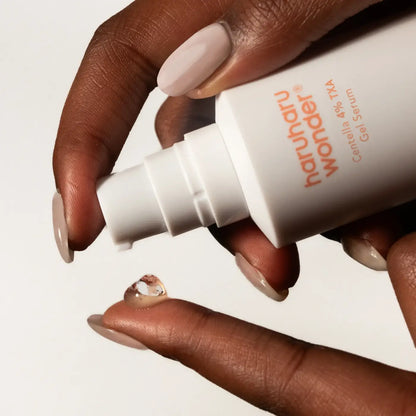 White cylindrical bottle of harunahar candelilla 4% txa gel serum with white pump from best korean skincare brands sa