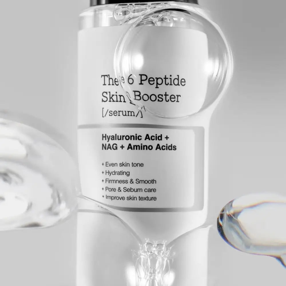 Clear glass bottle with minimalist white label black text for 6 peptide skin booster serum with hyaluronic acid authentic k-beauty