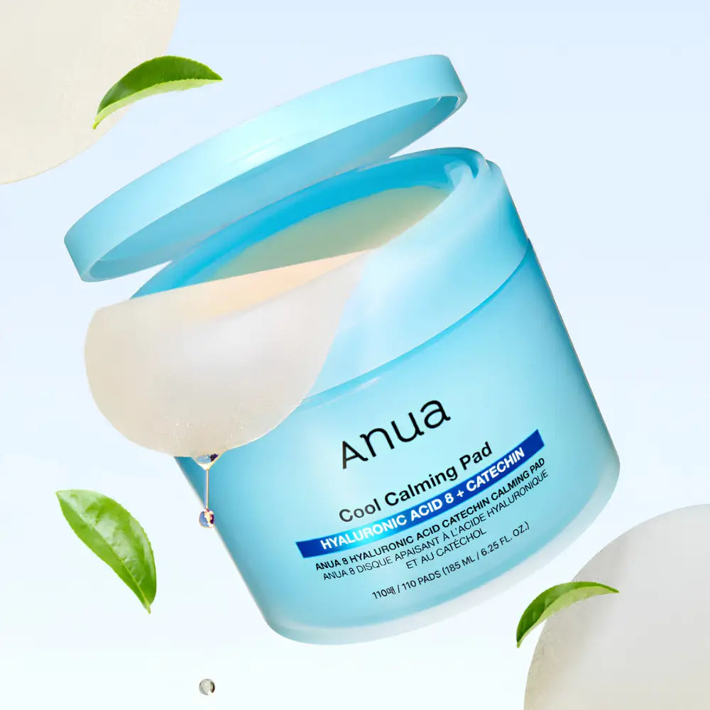 Light blue cylindrical container with lid featuring anua 8 hyaluronic acid catechin calming pads for authentic k-beauty