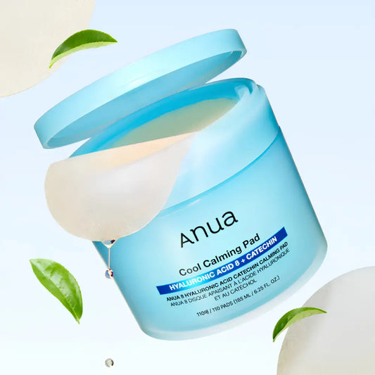 Light blue cylindrical container with lid featuring anua 8 hyaluronic acid catechin calming pads for authentic k-beauty