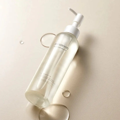 Clear glass bottle of Mixsoon Blossom bean cleansing oil 195ml with white pump dispenser for gentle cleansing oil use