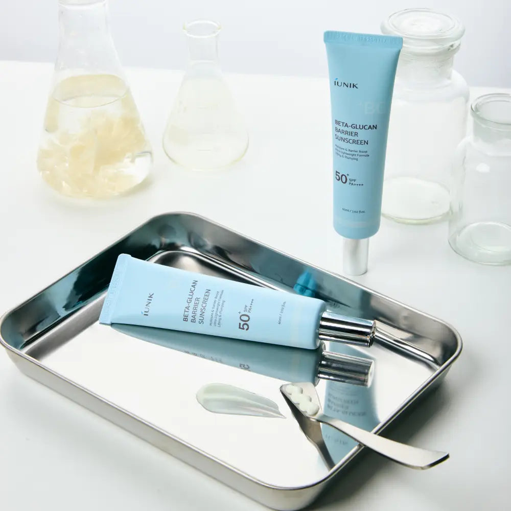 Light blue tube of innisfree beta glucan barrier sunscreen spf 50 with silver cap on reflective metal tray for skin care authentic k-beauty south africa