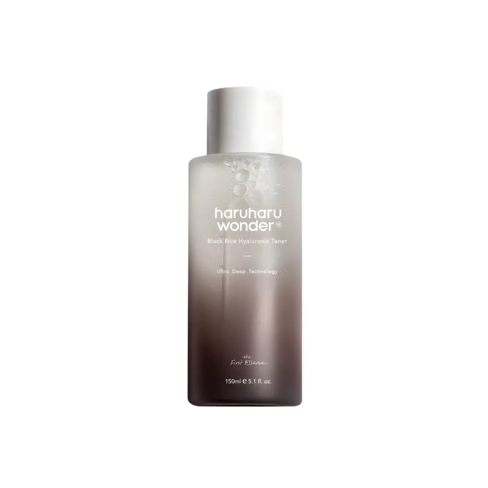 A sleek gradient-tinted glass bottle of haruharu wonder black rice hydrating toner for authentic k-beauty and korean skincare south africa