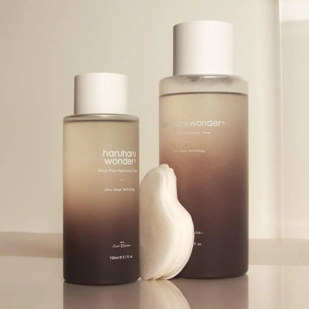 Two translucent gradient bottles of haruharu wonder black rice hydrating toner 150ml for authentic k-beauty korean skincare south africa