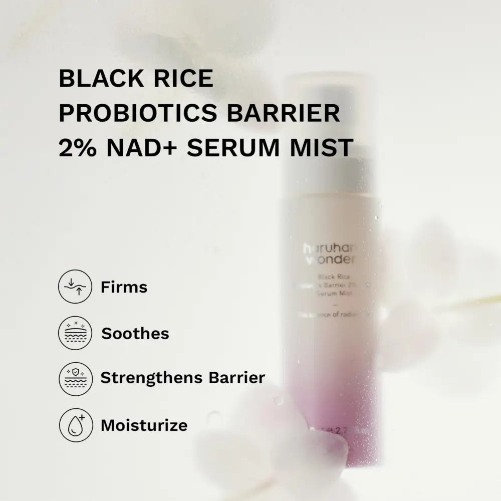 A sleek translucent bottle with gradient pink to white hue and frosted cap contains black rice probiotics barrier 2% nad serum mist