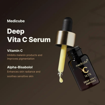 Medicube deep vita c ampoule in black glass with gold dropper dripping 14.5% vitamin c serum rich yellow liquid