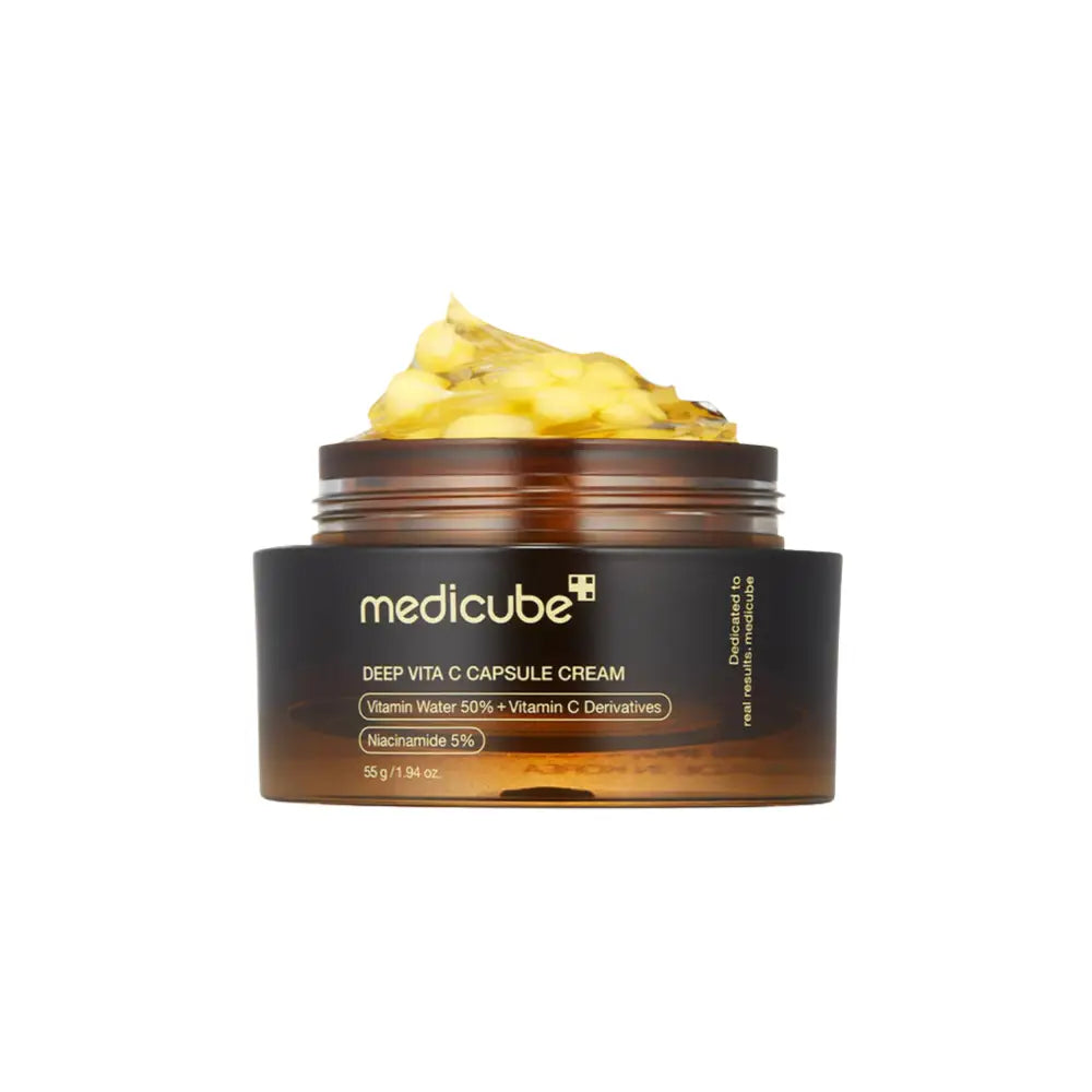 Medicube deep vita c capsule cream 55g in amber glass jar with black label showing golden-yellow gel capsule cream