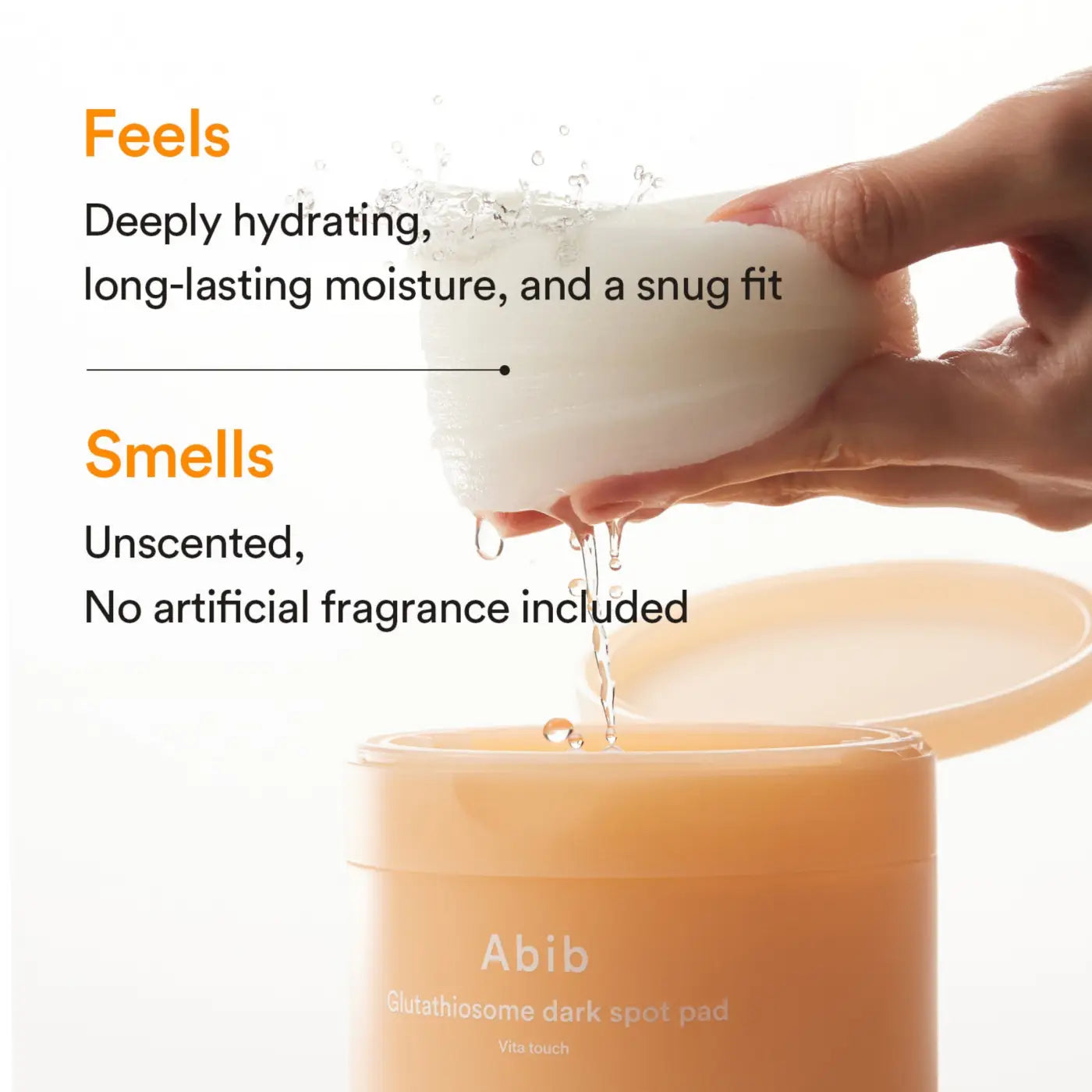 White soft-textured glutathiosome dark spot pad in sleek orange container for brightening vitamin c toner use