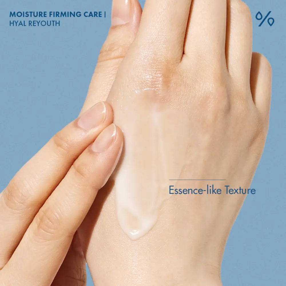 A translucent gel-like essence of ceuracle hyal reyouth moist sun spf 50+ pa++++ being applied to the back of a hand