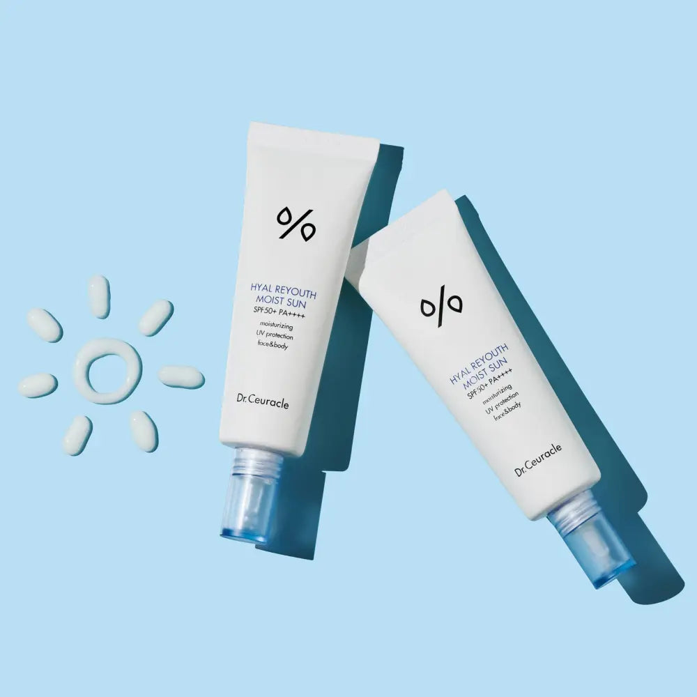 Two white dr bottles of ceuracle hyal reyouth moist sun spf 50 plus pa plus plus plus 50ml sunscreen product