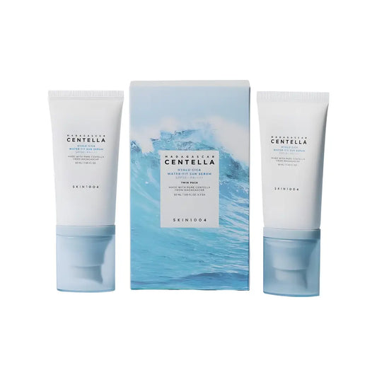 Two white tubes of madagascar centella hyalu cica sun serum twin pack with blue ocean wave box packaging