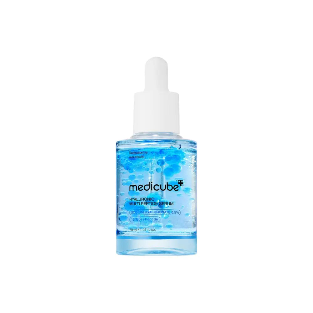 A clear blue glass bottle of medicube hyaluronic multi peptide serum with white dropper cap and visible bubbles