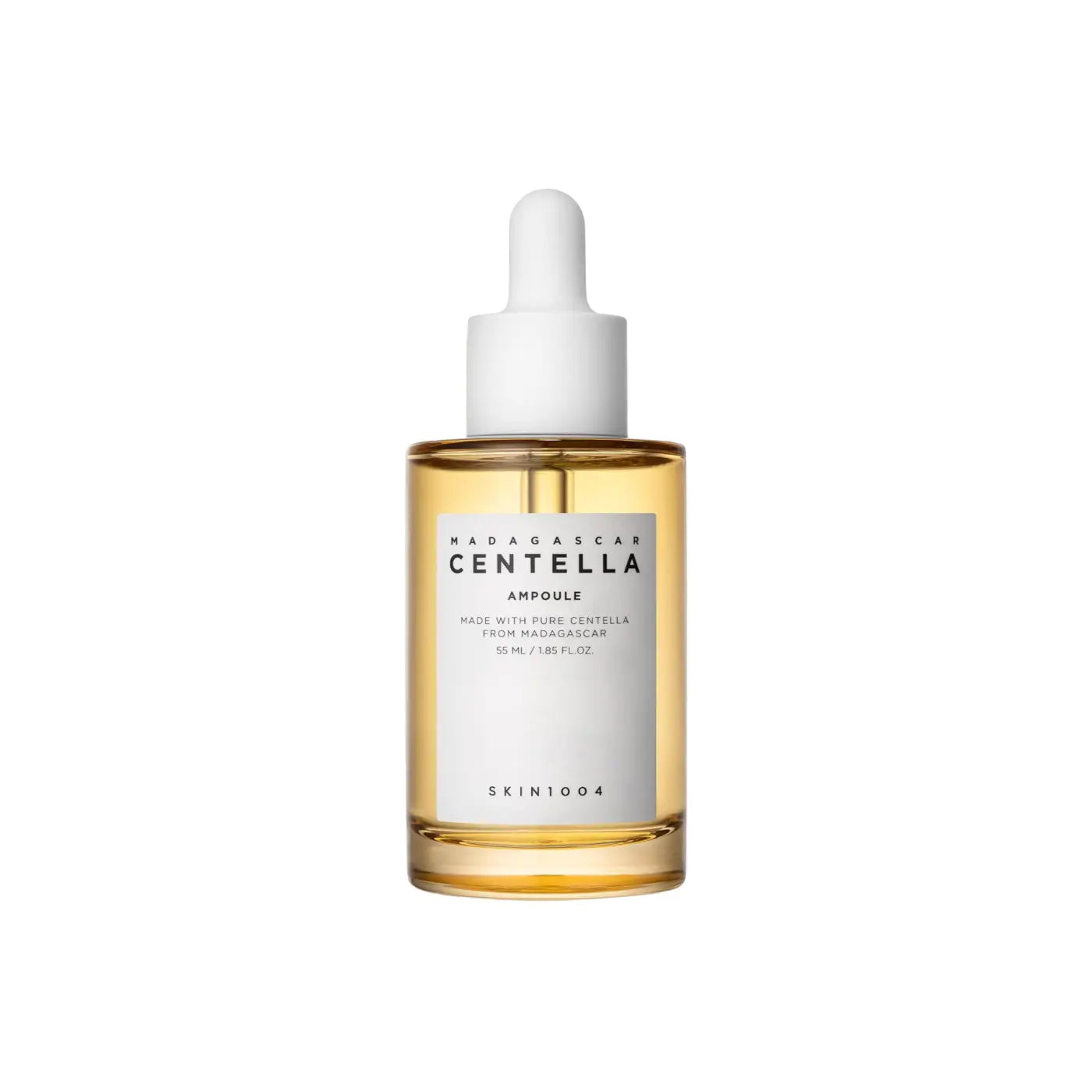 A clear glass bottle with white dropper cap containing golden-yellow madagascar centella ampoule by skin1004
