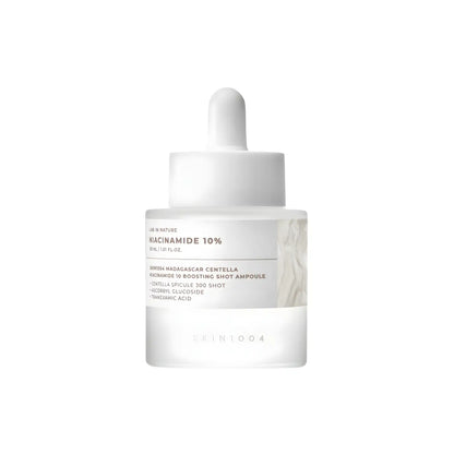 Clear glass bottle with white dropper and minimalist label featuring niacinamide 10 for madagascar centella niacinamide boosting shot ampoule