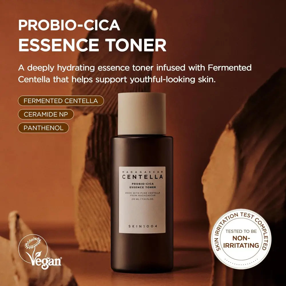 Dark brown glass bottle with matte white cap and minimalist label of skin1004 madagascar centella probio-cica essence toner 210ml