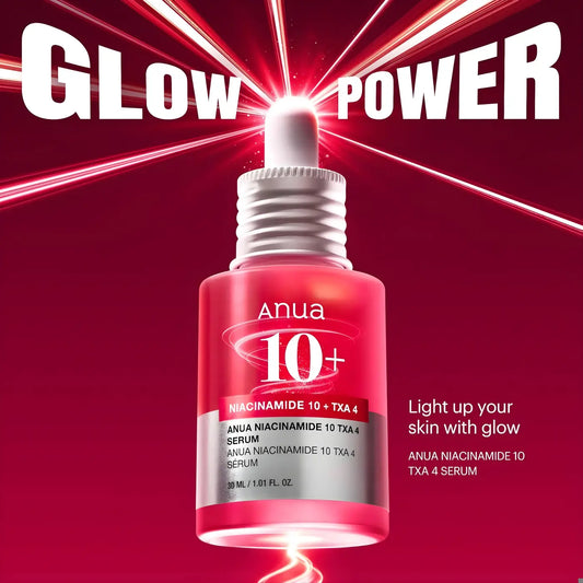 A sleek red glass bottle of anua niacinamide 10 plus txa 4 serum for dark spots with tranexamic acid korean skincare south