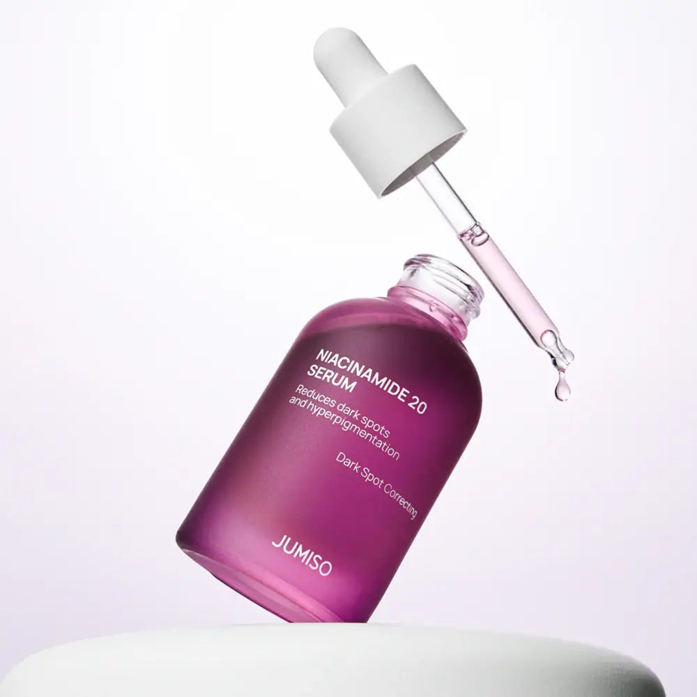 A sleek translucent purple glass bottle of jumiso niacinamide 20 serum 40ml with white dropper cap for excess sebum control