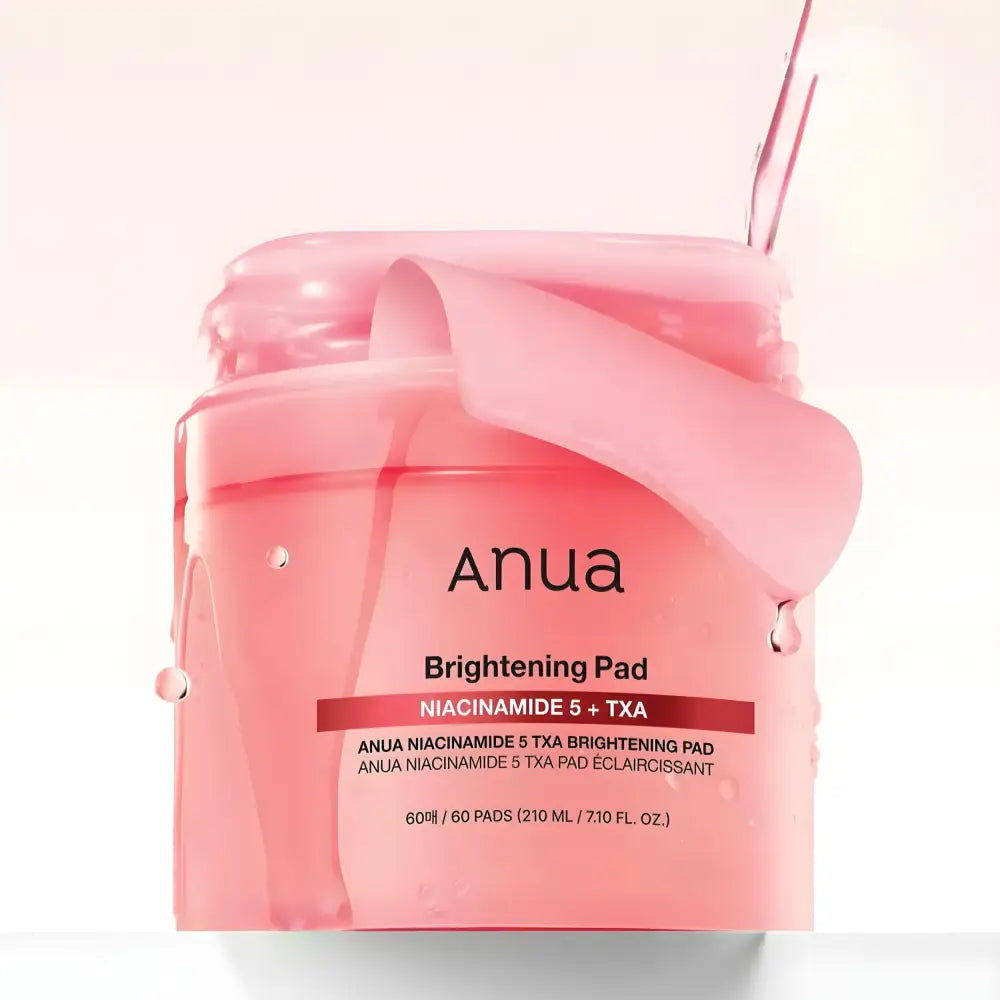Pink translucent jar of anua niacinamide 5 txa brightening toner pads with glossy finish for authentic k-beauty south africa