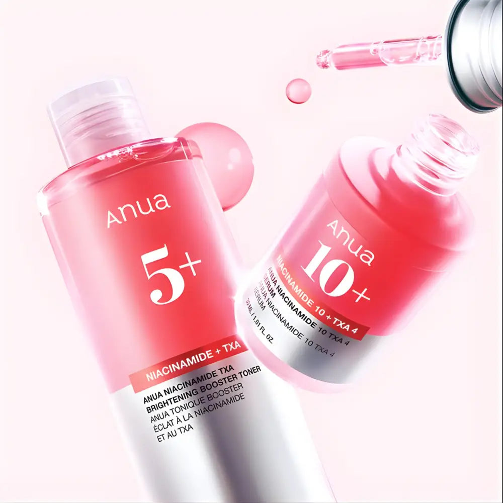 Pink anua niacinamide txa brightening booster toner 250ml clear glass bottles with white labels and bold red numerals