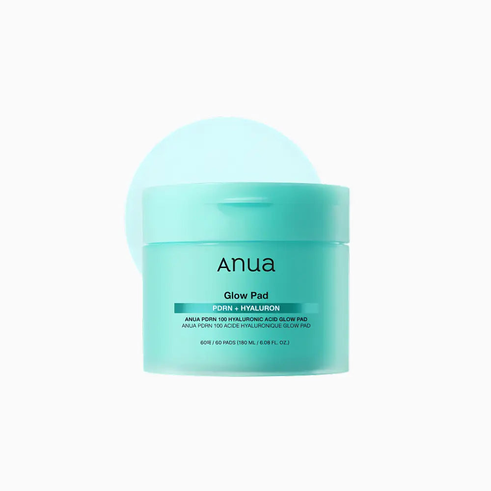 A sleek translucent teal anua glow pad jar with minimalist labeling for authentic k-beauty korean skincare south africa