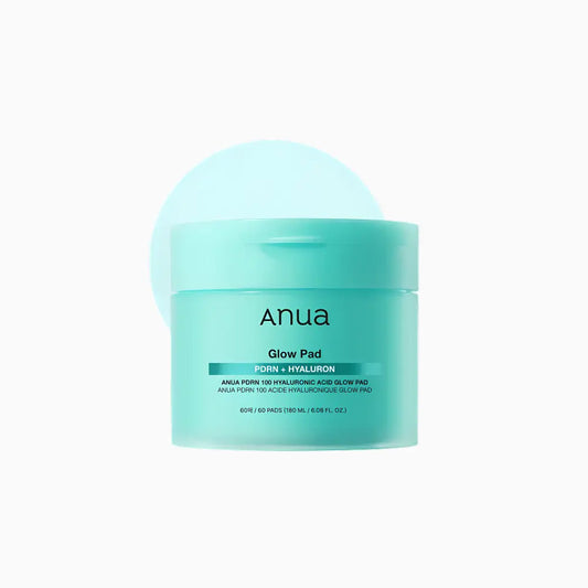 A sleek translucent teal anua glow pad jar with minimalist labeling for authentic k-beauty korean skincare south africa