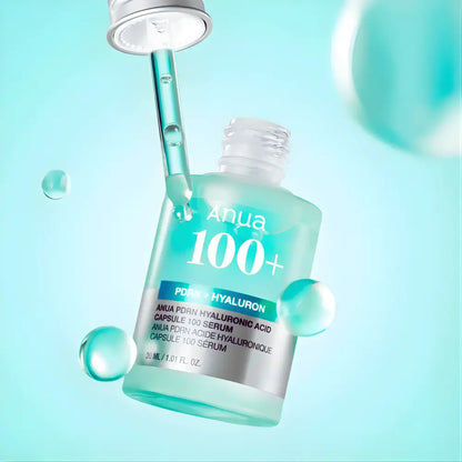 A translucent teal glass bottle of anua pdrn hyaluronic acid capsule 100 serum with silver dropper cap 30ml