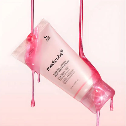 A translucent pink tube of medicube pdrn pink caffeine night-wrapping mask 75ml with product droplets on sides