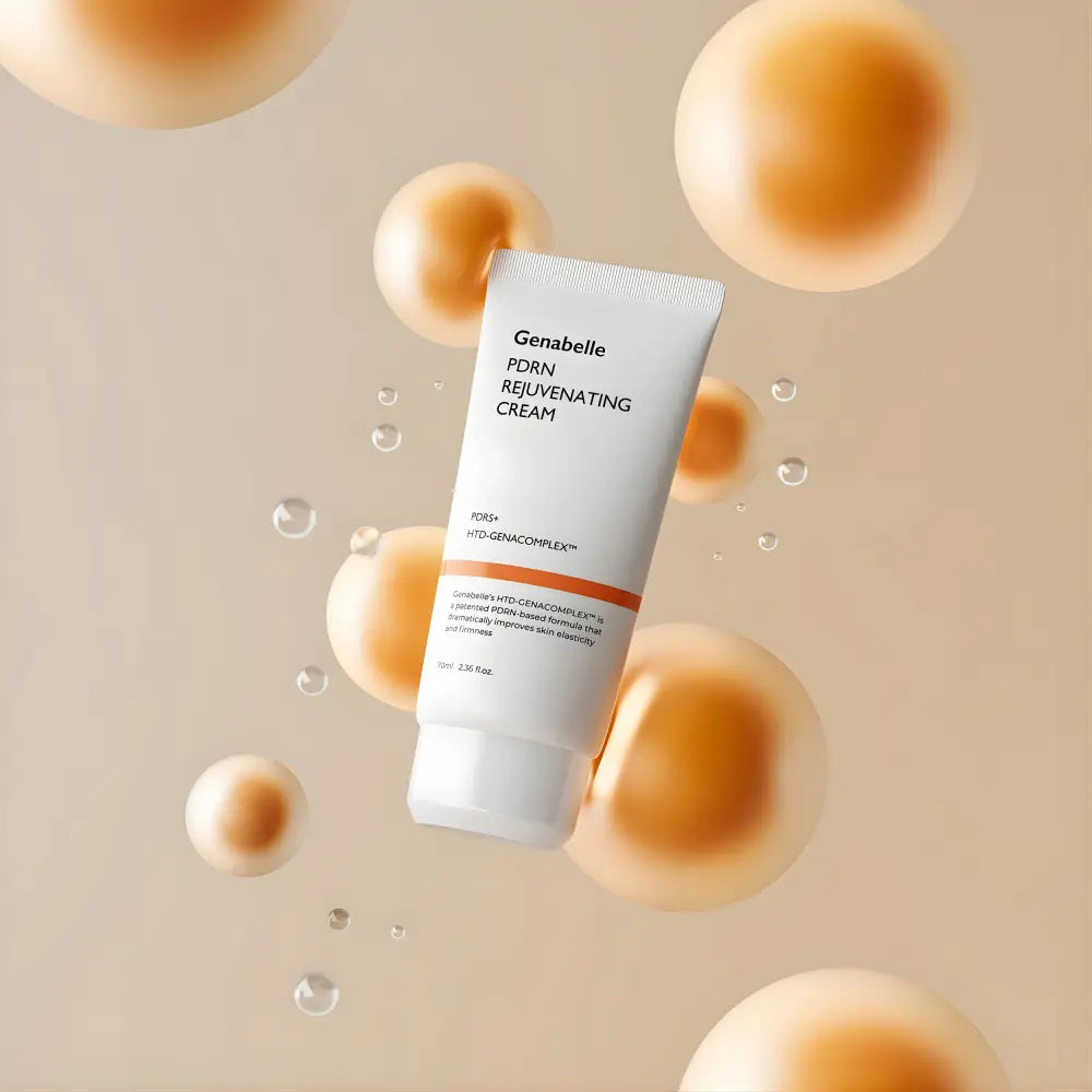 A sleek white tube of genabelle pdrn rejuvenating cream 70ml with minimalist design and orange accent stripe for korean skincare south