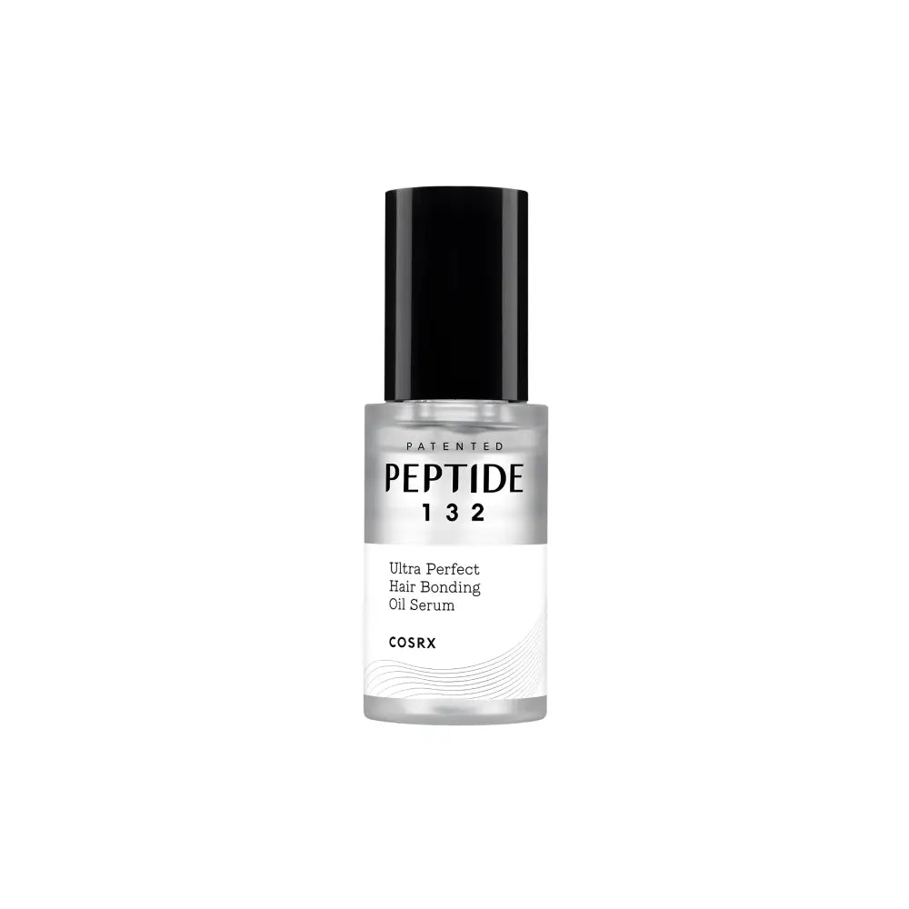 A sleek transparent glass bottle with black cap labeled cosrx peptide-132 ultra perfect hair bonding oil serum