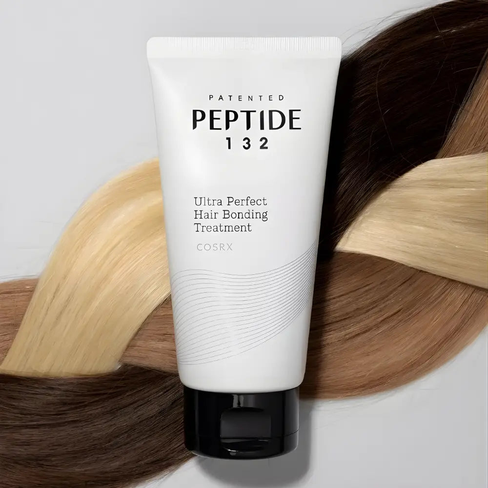 White tube of Cosrx Peptide 132 ultra perfect hair bonding treatment with black cap for perfect hair bonding care