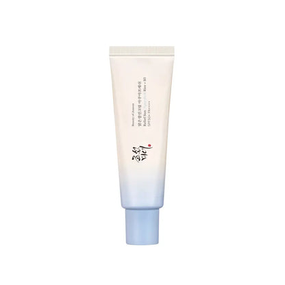 A sleek relief sun aqua-fresh rice b5 sunscreen tube with gradient pastel blue to white and k-beauty south africa appeal