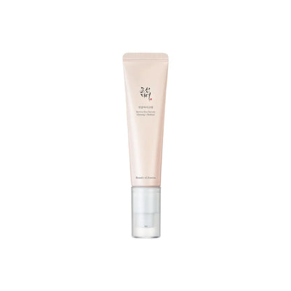 A sleek pale pink tube of jowar revive eye serum with retinal liposomes and korean skincare branding in clear pump dispenser