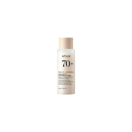 A sleek transparent bottle with beige cap and minimalist label of anua rice glow milky toner for skin barrier