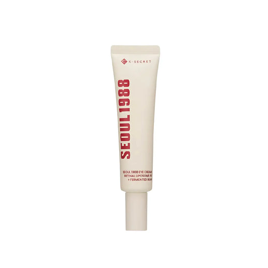 Creamy off-white tube of k-secret seoul 1988 eye cream with retinal liposome 4% for the eye area with bold red lettering