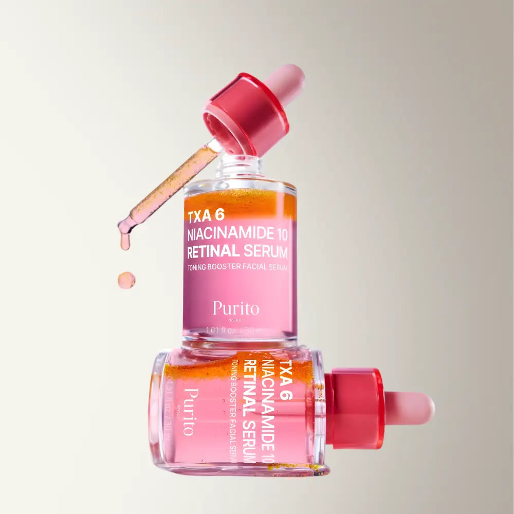 Pink glass dropper bottle of purito txa 6 niacinamide 10 retinal serum with red cap for skin care use