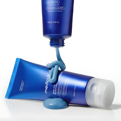 Deep blue matte tube of Mediclinic zero pore blackhead mud mask 100g with white cap and product dollop squeezed out