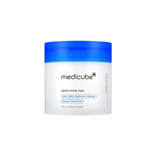 A white cylindrical medicube zero pore pad container with a vibrant blue lid featuring authentic korean skincare aha fruit extracts
