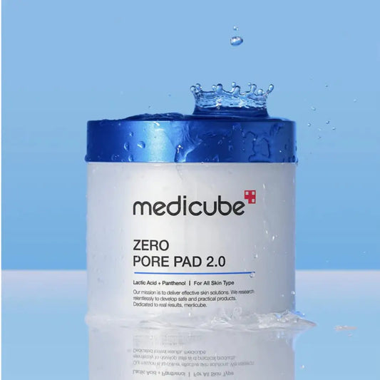 White cylindrical zero pore pad jar with blue lid featuring lactic acid and panthenol in authentic korean skincare